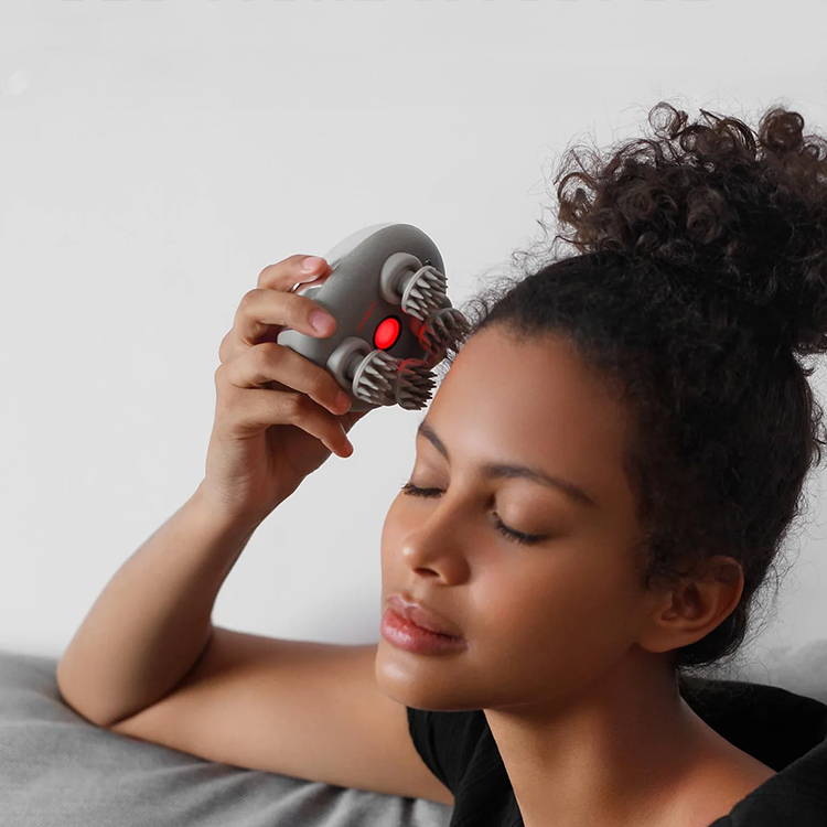 Massageapparat til hovedbunden, Breo